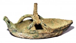 A BRONZE SHIP MODEL WITH ANIMAL-SHAPED PROW Sardinia, Nuraghi Culture, 7th century BCE. 17 cm long. In good condition. Ex Shlomo Moussaieff collection...
