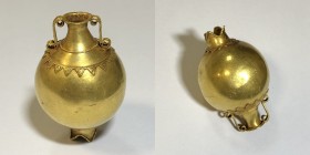 A GOLD AMPHORISKOS/POMEGRANATE Phoenician-Punic, 7th-6th century BCE. 9.44 gr. 3.9 cm high. With granulated decoration around the shoulder and under t...