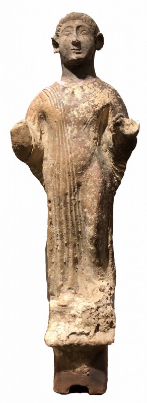 A PHOENICIAN TERRACOTTA STATUE OF A WORSHIPER, FOUND IN THE SEA 5th-4th century ...