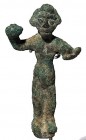 A BRONZE FIGURINE OF A YOUTH HOLDING A SPHERE IN BOTH HANDS 1st millennium BCE. 8.0 cm high. With nice green patina and in very good condition. Ex Shl...