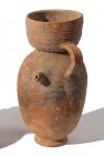 A TERRACOTTA JUGLET WITH SPOUT Nabatean, Roman Period, ca. 1st century BCE-CE. 13.7 cm high. In very good condition. Ex Shlomo Moussaieff collection, ...