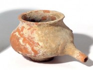 A NABATEAN TERRACOTTA MINI BOWL WITH SPOUT 1st century BCE-CE. 6.0 cm in diameter. Made of very thin red ceramic. In very good condition. Ex Judge Ste...