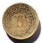 A JEWISH BABYLONIAN ARAMAIC TERRACOTTA INCANTATION BOWL 6th-7th century CE. Depicting a human figure surrounded by Aramaic inscription, beginning: “Ma...