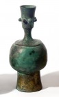 AN ISLAMIC BRONZE SPRINKLER BOTTLE 12th – 13th century CE. 15.5 cm high. With floral decorations on the shoulders and the base. With nice green patina...
