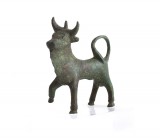 Etruscan Bronze Figure of a Magic Triple-Horned Bull, 4th – 3rd century BC; length cm 6; Standing with front right leg raised as though about to walk;...