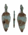 Couple of Greek Bronze Leaf-Shaped Belt Stirrups, 4th - 3rd century BC; length cm 10 (each); Decorated with warrior or divinity heads. Provenance: Eng...