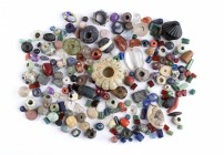 Group of Several Greek, Etruscan, Roman and Medieval Glass Beads ; diam. max cm 3. Provenance: English private collection, bought before 2000.