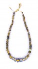 Eastern Eye-Bead Necklace, 8th - 7th century BC; length cm 25; Composed of a string of blue yellow eye-beads. Provenance: English private collection.