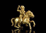 Gold Scythian knight Figure, ca. 4th century BC; length cm 2,4; gr. 13,41; Provenance: Swiss private collection, 1970s-1980s.