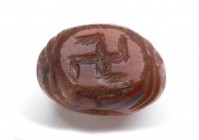 Bactrian Carnelian Bead and Seal with Swastika; Central Asia, Oxus Civilization, 3rd - early 2nd millennium BC; height cm 1,7. Provenance: European pr...