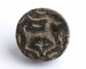 Bactrian Stone Button Seal with Ibex in the Bushes; Central Asia, Oxus Civilization, 3rd - early 2nd millennium BC; length cm 2,4. Provenance: Europea...