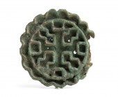 Bactrian Bronze Stamp Seal with Cruciform Motif; Central Asia, Oxus Civilization, 3rd - early 2nd millennium BC; diam cm 5. Provenance: European priva...