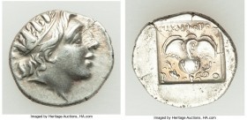 CARIAN ISLANDS. Rhodes. Ca. 88-84 BC. AR drachm (15mm, 2.27 gm, 12h). XF. Plinthophoric standard, Nicephorus, magistrate. Radiate head of Helios right...