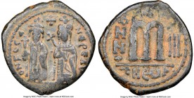 Phocas (AD 602-610). AE follis or 40 nummi (28mm, 5h). NGC Choice Fine S. Theoupolis (Antioch), Regnal Year 3 (AD 604/5). O N FOCA-NЄ PE P V, Phocas (...