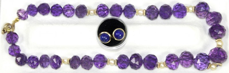 Colliers und Halsketten
Amethyst-Collier aus 31 geschliffenen Amethystperlen un...