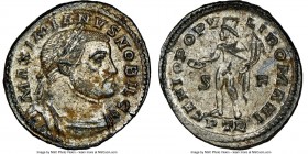 Galerius, as Caesar (AD 305-311). BI follis or nummus (28mm, 10.05 gm, 5h). NGC MS 5/5 - 4/5, Silvering. Trier, 1st officina, AD 303-305. MAXIMIANVS N...