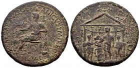 Calígula. Sestercio. 39-40 d.C. Roma. (Ric-44). Anv.: Pietas sentada a izquierda. Rev.: Calígula de pie a la izquierda, sosteniendo una patera sobre u...