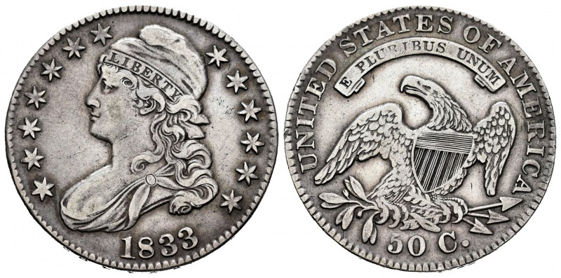 Estados Unidos. 1/2 dollar. 1833. Philadelphia. (Km-37). Ag. 13,33 g. Tono. MBC+...