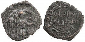 SALDUQIDS: Nasir al-Dawla Ghazi, 1132-1145, AE fals (4.91g), ND, A-B1890, standing figure holding long cross and diadem, with cornucopia in background...