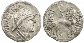 YUEH CHI: Sapadbizes, late 1st century BC, AR drachm (1.40g), Mitch-2824/28, helmeted bust right, floral design on the helmet, name behind // lion rig...