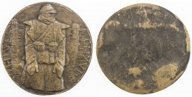 FRANCE: AE medal (97.17g), 1916, 83mm cast bronze uniface medal simply showing a French soldier in winter by P. B., helmeted and uniformed soldier in ...