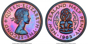 Elizabeth II Proof 1/2 Penny 1963 PR63 Brown PCGS, KM23.2. Blending electric neon with lilac and peach toning in a brilliant visual display. 

HID09...