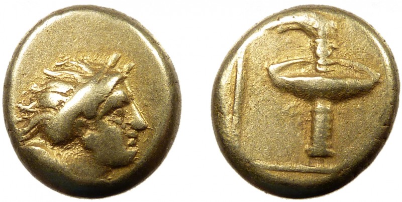 Greek, Lesbos, c. 352 BC, EL Hekte, Mytilene 
2.52 g, 11 mm, VF

Obverse: Bust o...