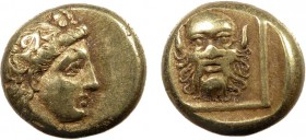 Greek, Lesbos, c. 377-326 BC, EL Hekte, Mytilene 
2.56 g, 10 mm, VF

Obverse: Wreathed head of young Dionysos right
Reverse: Facing head of Silenos wi...