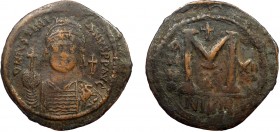 Byzantine, Justinian I, AE Follis, Nikomedia
20.47 g, 43 mm, aVF

Obverse: D N IVSTINI-ANVS P P AVG, helmeted and cuirassed bust facing, holding cross...