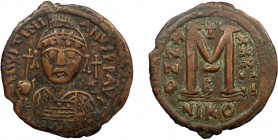 Byzantine, Justinian I, AE Follis, Nikomedia
17.49 g, 34 mm, VF

Obverse: D N IVSTINI-ANVS PP AVG, cuirassed and helmeted facing bust, holding globus ...
