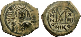 Byzantine, Maurice Tiberius, AE Follis, Nikomedia
12.58 g, 30 mm, VF

Obverse: M AVP TIP PB, crowned and cuirassed bust facing, holding globus crucige...