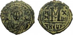 Byzantine, Maurice Tiberius, AE Follis, Theoupolis (Antioch)
10.37 g, 30 mm, VF

Obverse: δ N mAЧΓI CN P AЧT, crowned facing bust, wearing consular ro...