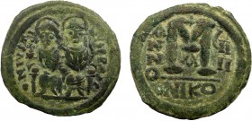 Byzantine, Justin II, AE Follis, Nikomedia
11.47 g, 29 mm, VF

Obverse: DN IVSTINVS PP AVG; Justin II and Sophia seated facing
Reverse: Large M; c...