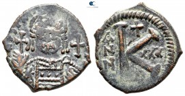 Justinian I AD 527-565. Uncertain mint. Half follis Æ