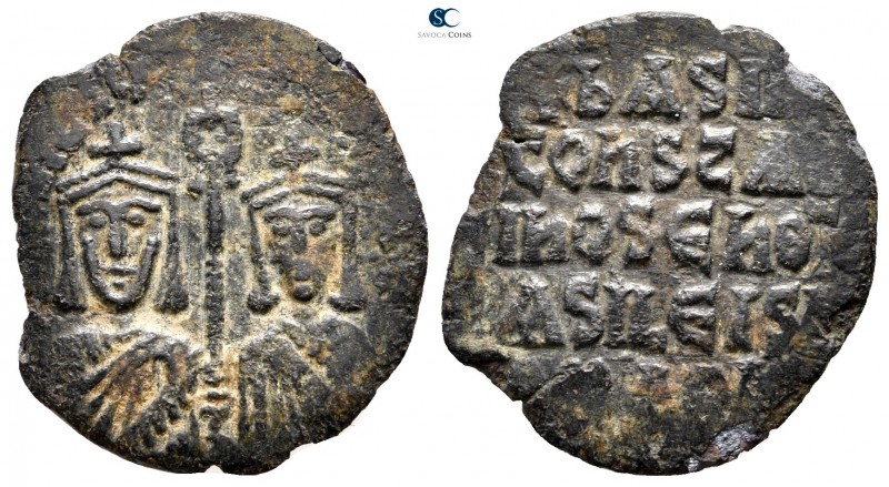 Basil I the Macedonian, with Constantine. AD 867-886. Uncertain mint
Follis Æ
...