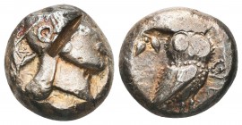 Greek, Archaic Attica, c. 546-527 BC, AR Tetradrachm, Athens Obverse: Head of Athena right, wearing earring and crested Attic helmet, hair shown as pa...