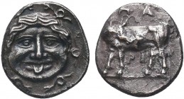 Greek, Mysia, c. 4th Century BC, AR Hemidrachm, Parion . Obverse: Facing gorgoneion with open mouth and tongue protruding Reverse: ΠA–PI, bull standin...