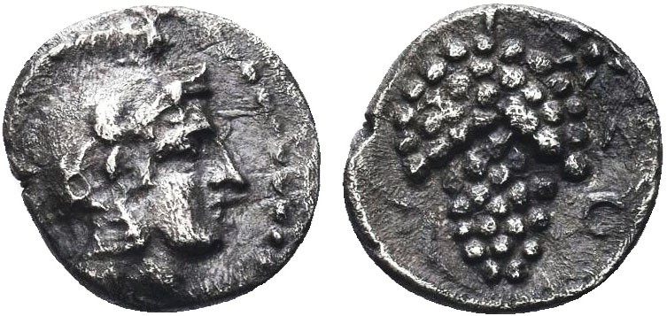Greek, Cilicia, c. 410-375 BC, AR Obol, Soloi . Obverse: Helmeted head of Athena...