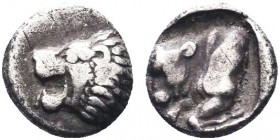 "Greek, Caria, c. 450-380 BC, AR Hemiobol, uncertain

Obverse: Head of lion left
Reverse: Forepart of Bull left
Reference: cf 33-34, Chersonesos var (...