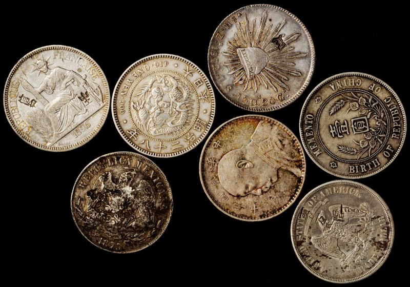 MIXED LOTS. Mixed Chopmarked Dollars (7 Pieces), 1875-1927. Grade Range: FINE to...