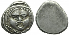 Etruria, Populonia, 20 Units, c. 400 BC; AR (g 8,37; mm 21; h -); Gorgoneion; below, XX with pellets, Rv. Blank. HNItaly 152; EC I, n. 54.11 (this coi...