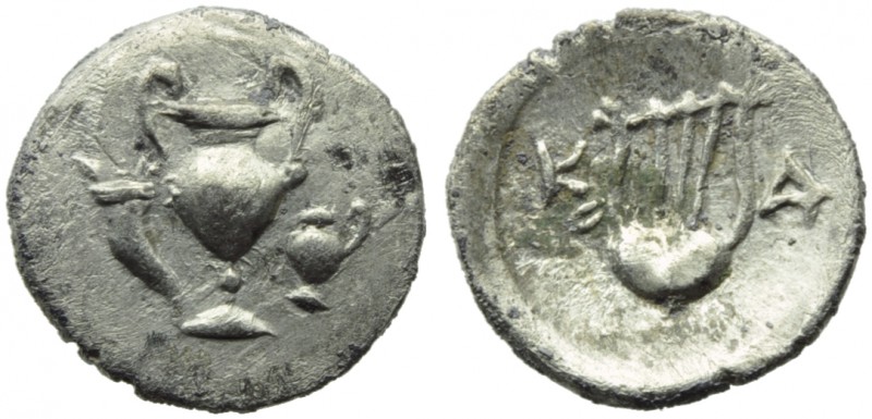 Apulia, Canusium, Obol, c. 300-250 BC; AR (g 0,52; mm 16; h 6); Cantharus betwee...