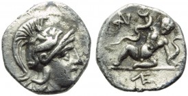 Apulia, Tarentum, Diobol, c. 250-230 BC; AR (g 0,99; mm 11; h 9); Head of Athena r., wearing Attic crested helmet, decorated with Skylla, Rv. Infant H...