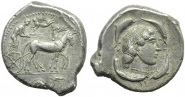Sicily, Syracuse, Second Democracy (466-405), Tetradrachm, c. 466-405 BC; AR (g 17,09; mm 29; h 11); Charioteer driving slow quadriga r.; above, flyin...