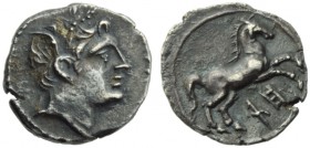 The Carthaginians in the Mediterranean, Uncertain Punic mint, 1/4 Shekel, c. 218-201 BC; AR (g 1,57; mm 15; h 11); Head of Triptolemos r., wearing wre...