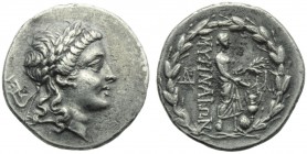 Aeolis, Myrina, Drachm, c. 155-145 BC; AR (g 3,88; mm 19; h 12); Laureate head of Apollo r., Rv. MYPINAIΩN, Apollo Grynios standing r., holding branch...