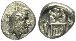 Kings of Persis, Uncertain king, Drachm, II cen. BC; AR (g 4,12; mm 17; h 10); Head r., wearing satrapal cap, Rv. King standing r., before temple; abo...