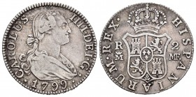 Carlos IV (1788-1808). 2 reales. 1799. Madrid. MF. (Cal 2019-607). Ag. 5,85 g. MBC-. Est...45,00. English: Charles IV (1788-1808). 2 reales. 1799. Mad...