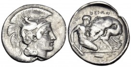 LUCANIA. Herakleia. Circa 390-340 BC. Nomos (Silver, 23.5 mm, 7.60 g, 5 h), circa 350-340. Head of Athena to right, wearing crested helmet ornamented,...