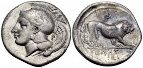 LUCANIA. Velia. Circa 340-334 BC. Didrachm or nomos (Silver, 23 mm, 7.33 g, 3 h), from the "Θ" group. Head of Athena to left, wearing crested Attic he...